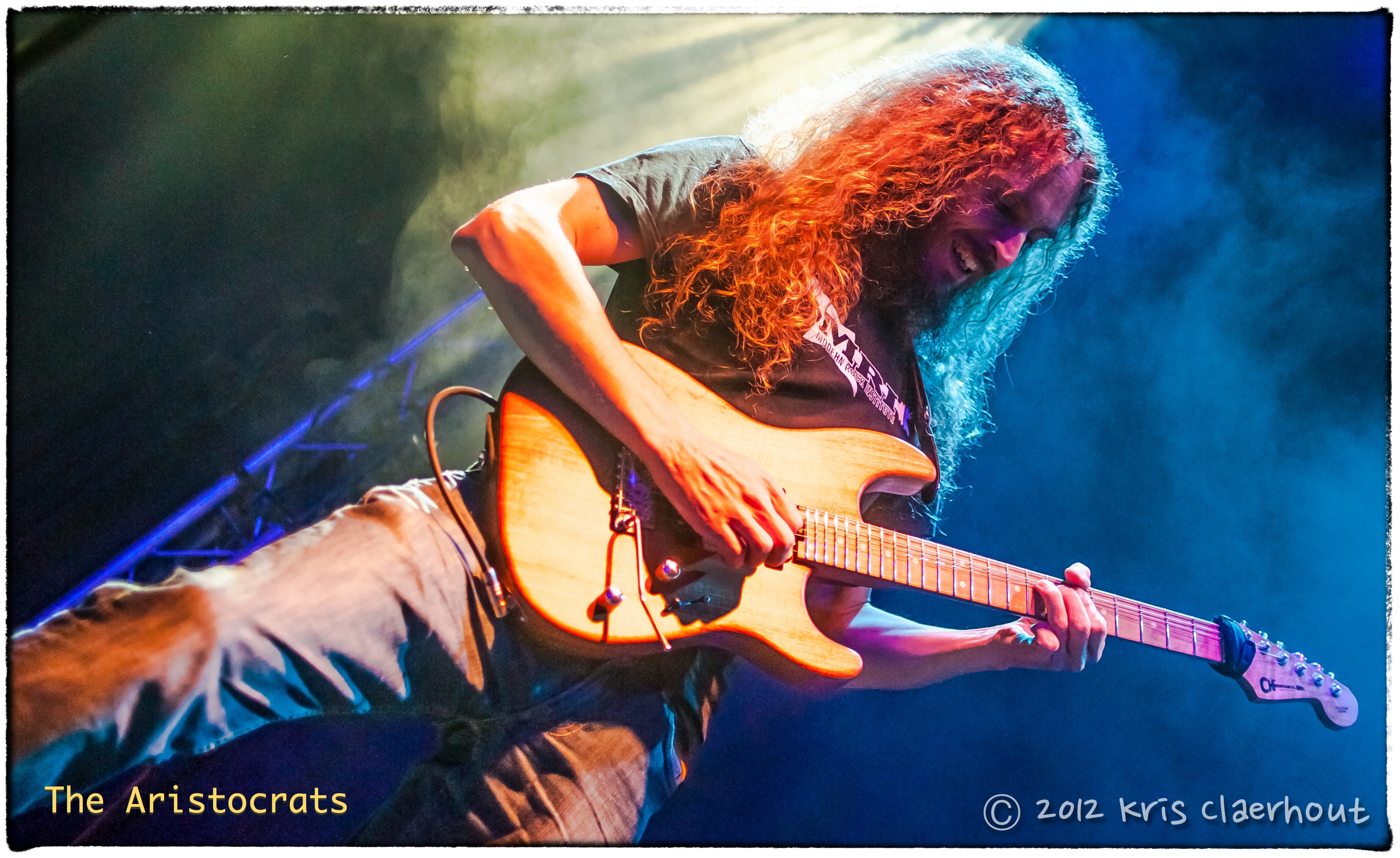 Guthrie Govan - The Aristocrats "Tres Caballeros" official publicity photo - by Mike Mesker